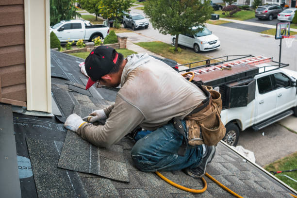 Professional Roofing technician working in Walden, NY